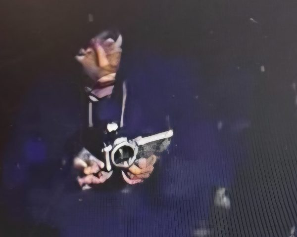 Man recording Covenant School grounds