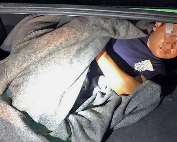 person in trunk